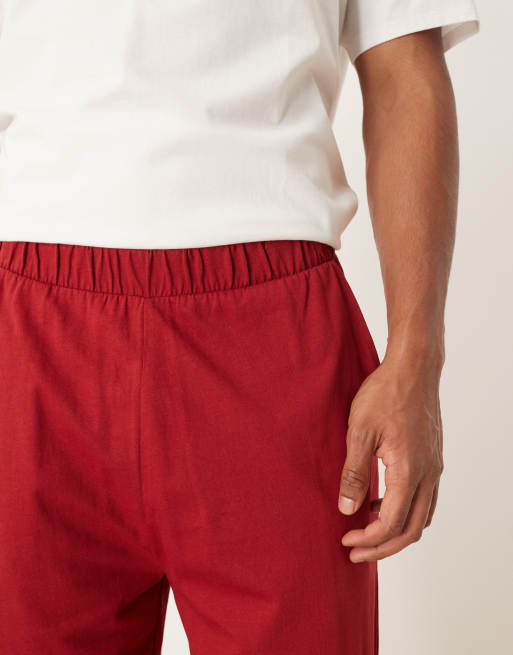 ASOS DESIGN Christmas pajama set with characters graphic in red