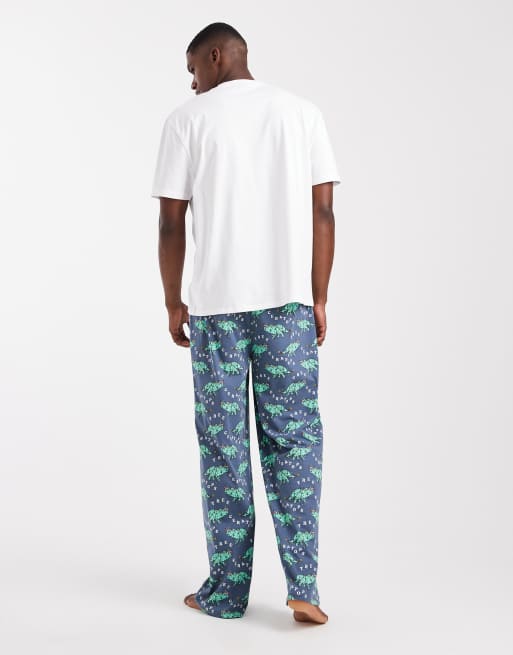 ASOS DESIGN Christmas pajama set with dinosaur graphic in navy