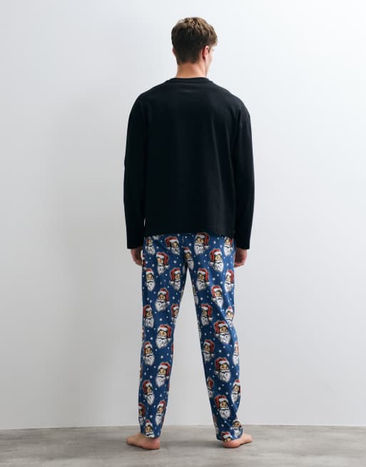ASOS DESIGN Christmas pyjamasbukser med julemandsgrafik i blå, 4 af 5