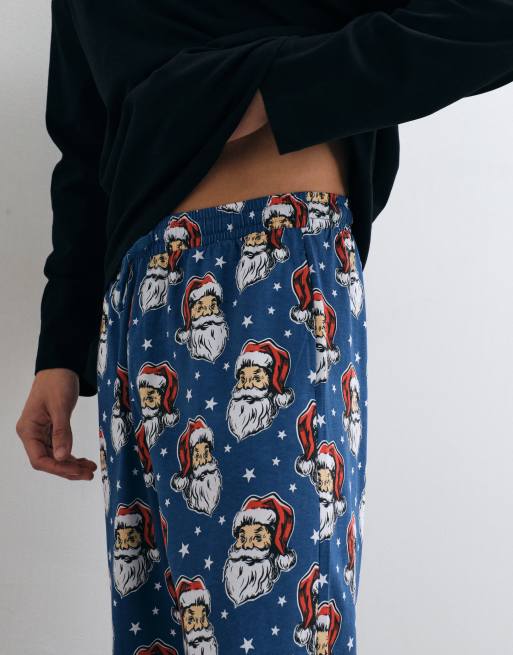 ASOS DESIGN Christmas pyjamasbukser med julemandsgrafik i blå, 5 af 5