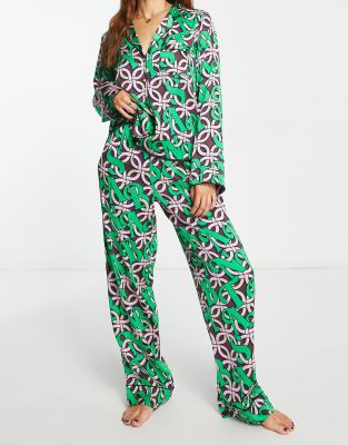 ASOS DESIGN Christmas santa baby satin shirt & trouser pyjama set in green & pink