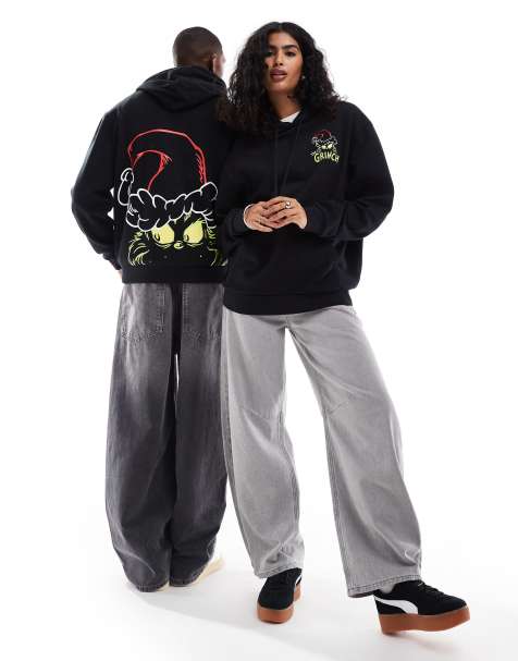 ASOS DESIGN Christmas unisex oversized hoodie with The Grinch festive prints in black - view 1