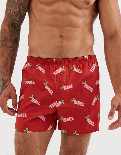 ASOS DESIGN Christmas woven boxer short in red with noel slogan