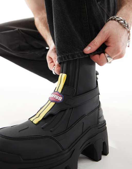 ASOS DESIGN chunky boot in black with motocross detailing ASOS