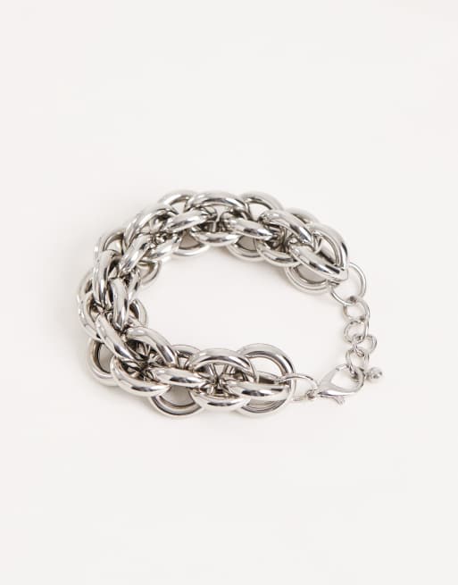 ASOS DESIGN chunky bracelet with intertwining links in silver tone
