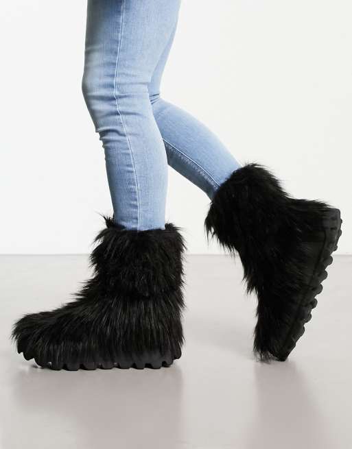 Boots with 2025 fur on it