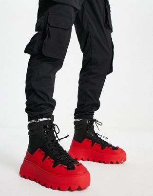 ASOS DESIGN chunky lace up boot in black with contrast red cage detail and sole
