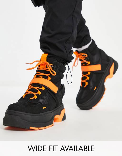 Orange lace up store boots