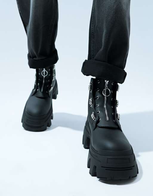 ASOS DESIGN chunky lace up boots in black with silver monogram detail ASOS