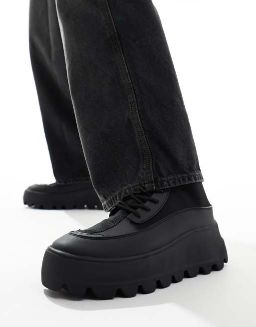 FhyzicsShops DESIGN chunky lace up sock boots in black with badge detail