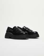 Schuh Ravi loafers in black PU