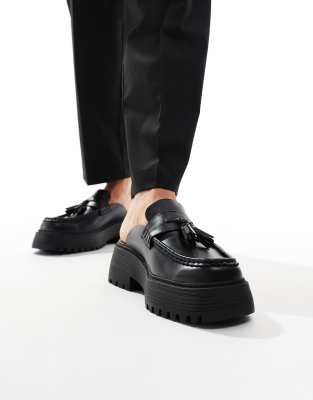 chunky mule loafers in black with tassel