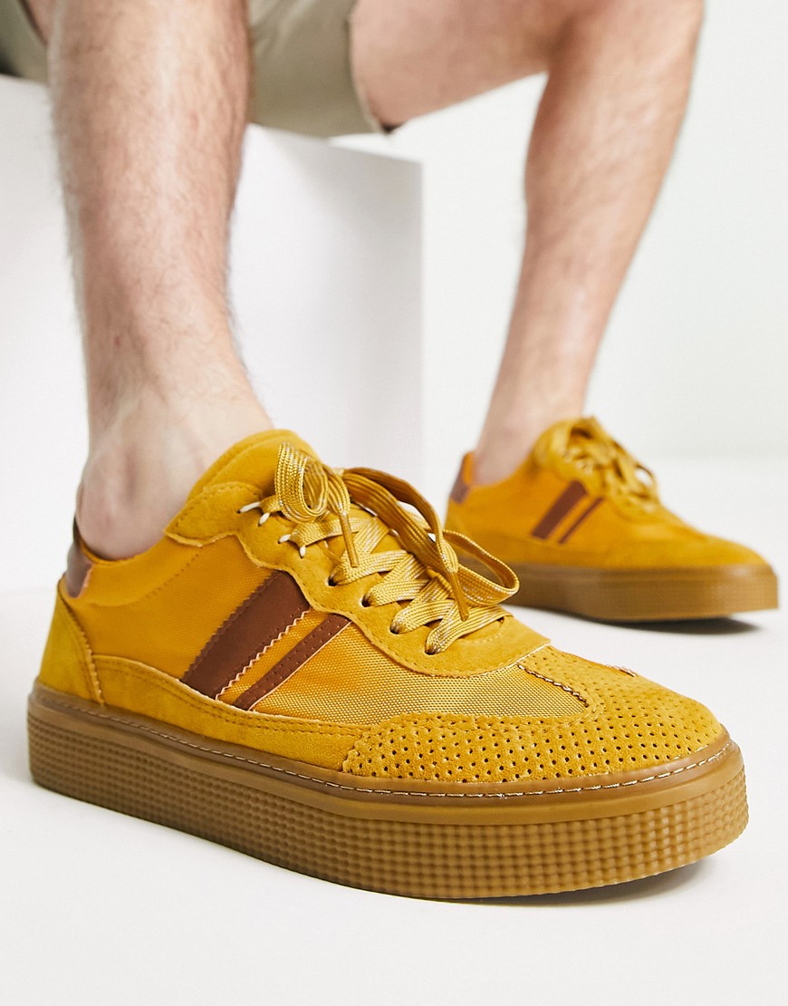 ASOS DESIGN chunky retro trainer in mustard faux suede with gum sole-Yellow