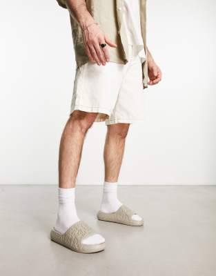 ASOS DESIGN chunky sliders with texture in stone-Neutral