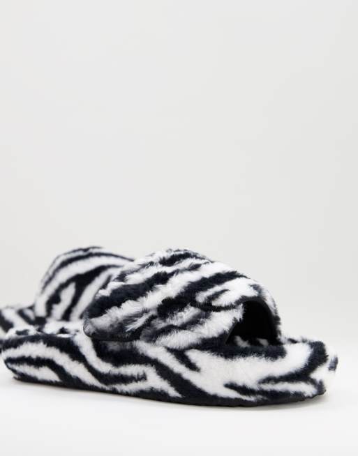 ASOS DESIGN chunky slippers in zebra faux fur