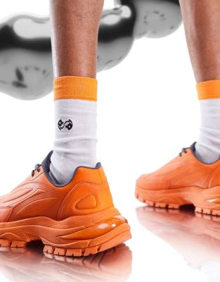 chunky orange sneakers