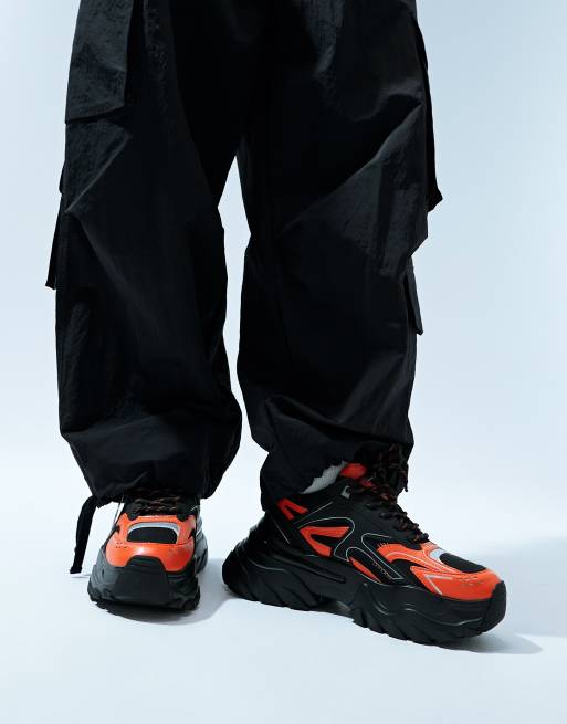 ASOS DESIGN chunky sneakers with black and orange panelling, 2 of 5