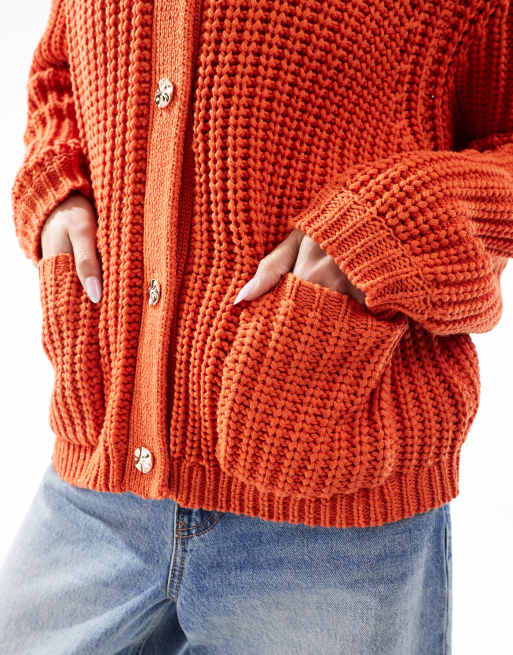 ASOS DESIGN chunky stitch cardigan with gold buttons in orange