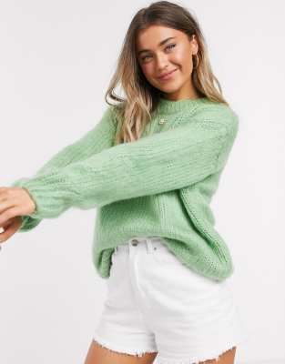 green chunky sweater