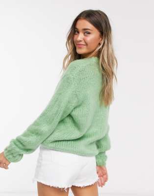 green chunky sweater