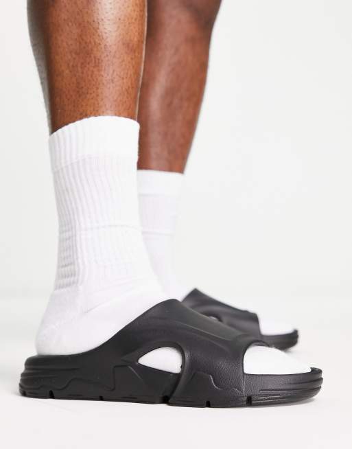 ASOS DESIGN chunky tech slides in black | ASOS