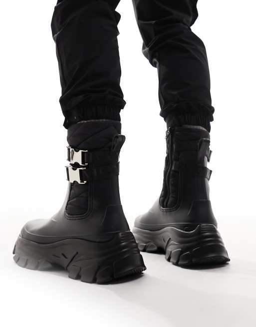 ASOS DESIGN chunky wellington boots in black with silver buckles