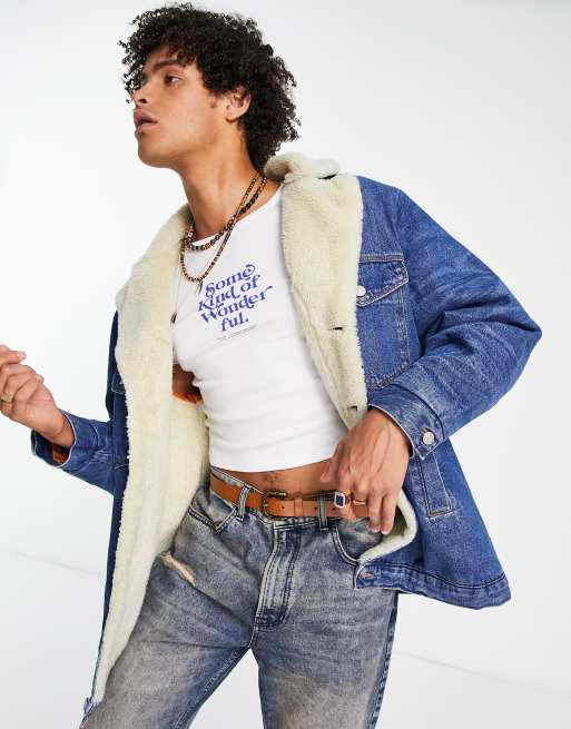 ASOS DESIGN – Ciemnoniebieska kurtka jeansowa w stylu lat 70. z podszewką z kożuszka 