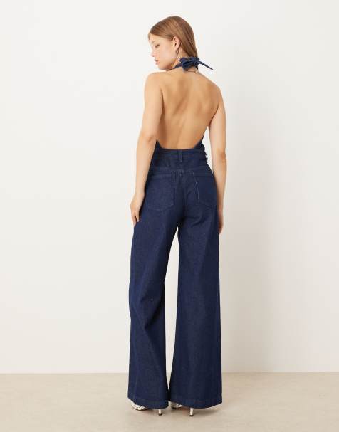 ASOS DESIGN – Ciemnoniebieski kombinezon jeansowy z dekoltem typu halter i szerokimi nogawkami - view 1