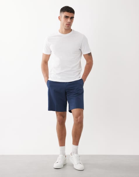ASOS DESIGN – Ciemnoniebieskie eleganckie szorty o regularnym kroju z podwiniętymi nogawkami - view 1