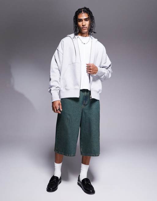ASOS DESIGN – Ciemnoniebieskie jeansowe jortsy o wydłużonym fasonie z efektem przebarwienia