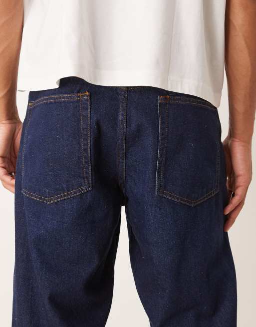 ASOS DESIGN – Ciemnoniebieskie jeansy o workowatym kroju z efektem sprania, 4 z 5