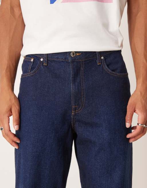 ASOS DESIGN – Ciemnoniebieskie jeansy o workowatym kroju z efektem sprania, 5 z 5