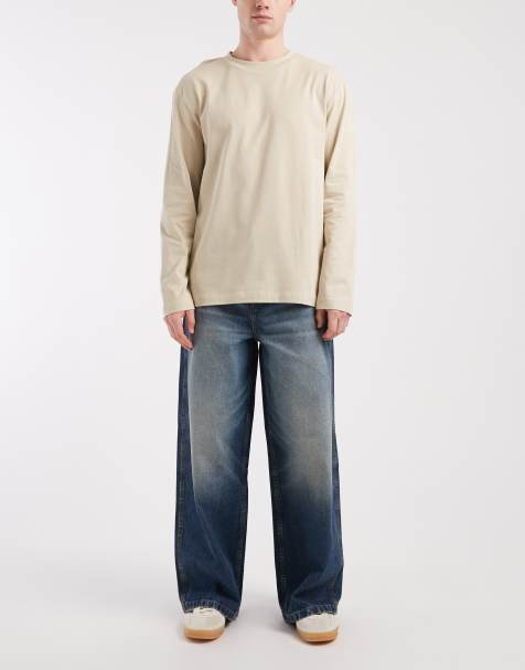 ASOS DESIGN – Ciemnoniebieskie jeansy skater z przebarwieniami - view 1