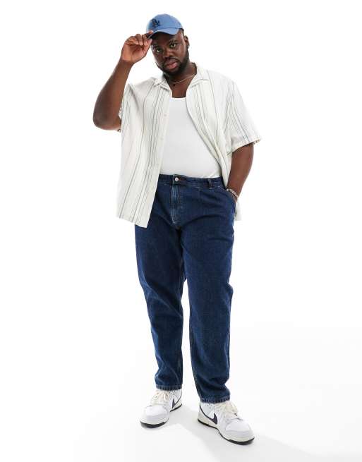 ASOS DESIGN – Ciemnoniebieskie jeansy z podwójnymi zaszewkami