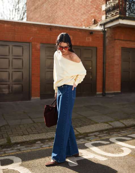 ASOS DESIGN – Ciemnoniebieskie jeansy z szerokimi nogawkami i kieszeniami z przodu - view 1