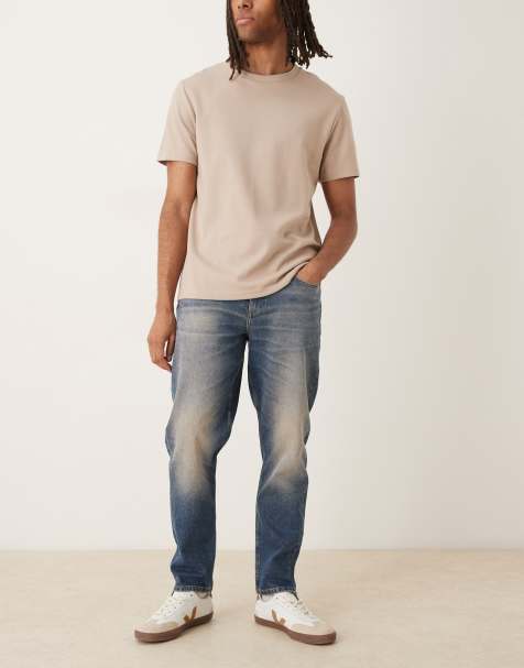 ASOS DESIGN stretch tapered jeans in dark wash blue