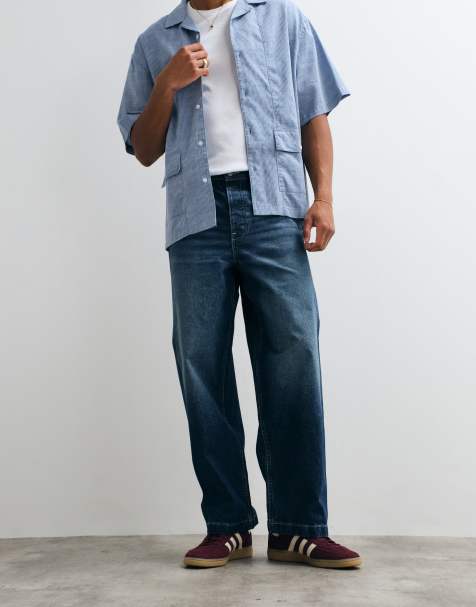 ASOS DESIGN – Ciemnoniebieskie luźne jeansy o prostym kroju z zakładkami i klamrą - view 1