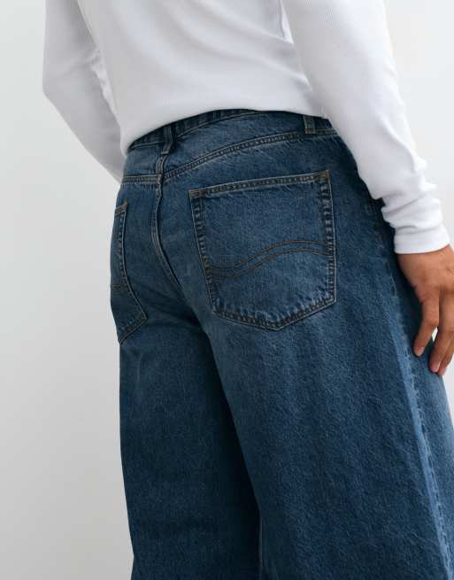 ASOS DESIGN – Ciemnoniebieskie luźne jeansy sprane w stylu vintage, 4 z 5