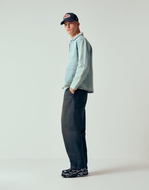 ASOS DESIGN – Ciemnoniebieskie luźne jeansy ze zwężanymi nogawkami i zakładkami - view 1
