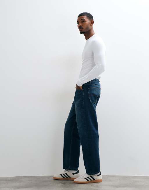 ASOS DESIGN – Ciemnoniebieskie luźne jeansy ze zwężanymi nogawkami, 2 z 5