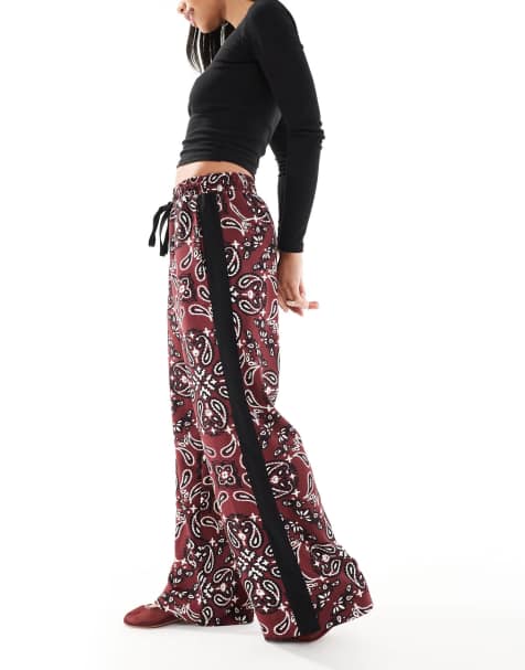 ASOS DESIGN pull on trousers with contrast panel in dark cherry bandana print