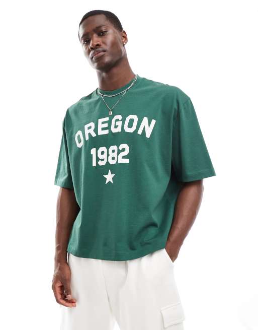 ASOS DESIGN – Ciemnozielony T-shirt o kroju pudełkowym oversize z napisem „Oregon” z przodu i taśmami na ramionach