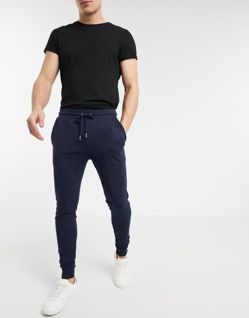 ASOS DESIGN – Cienkie granatowe joggersy o obcisłym kroju