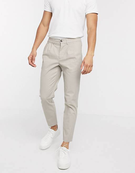 ASOS DESIGN cigarette chinos with pleats in beige | ASOS
