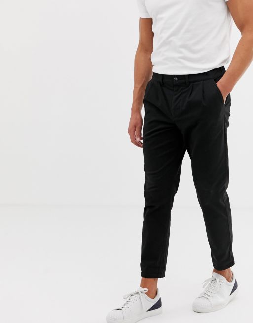 ASOS DESIGN cigarette chinos with pleats in black | ASOS