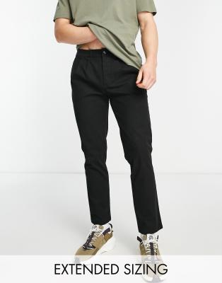 ASOS DESIGN cigarette chinos with pleats in black | ASOS