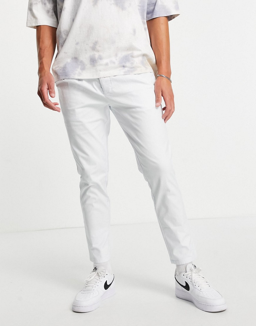 ASOS DESIGN cigarette chinos with pleats in white
