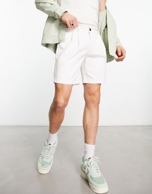 ASOS DESIGN pleated chino shorts in mid length in white