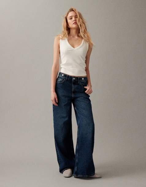 ASOS DESIGN cinch-back belt mid-rise jeans in mid blue - view 1