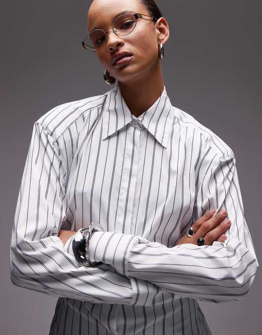 ASOS DESIGN cinch waist shirt with shoulder pads in navy pinstripe